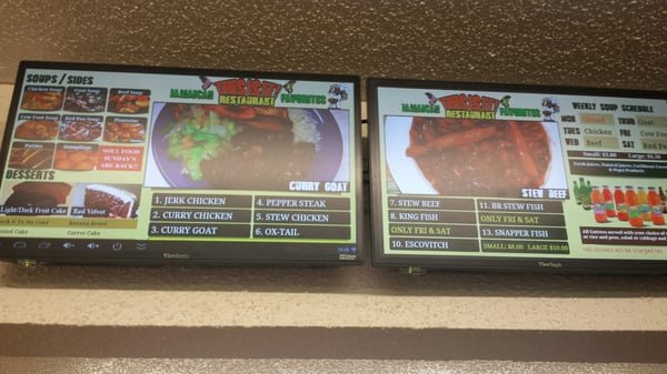 Printed menu with oxtails, chicken, and desserts.